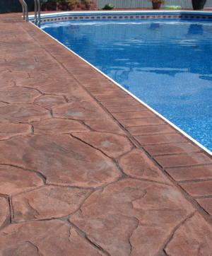Stamped Concrete Pool Deck - Random Stone with New Brick Soldier Course