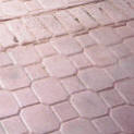 Cobble Paver Stamped Concrete with Old Brick Soldier Course Stamped Border