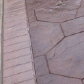 Old Brick Soldier Course with La Paz Slate Stamped Concrete Patio